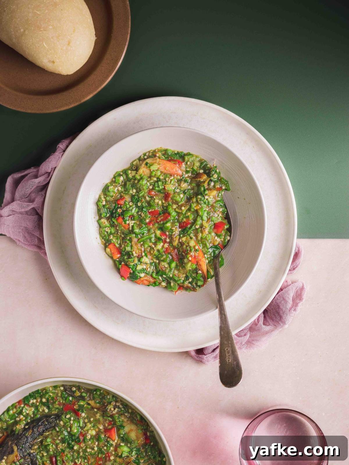 Okra stew served with eba.