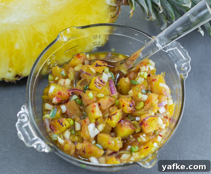Grilled Pineapple Salsa a la Plancha 2 Grilled pineapple caramelized on a skillet
