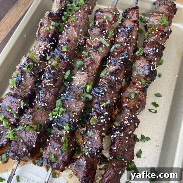 Juicy Grilled Chicken Skewers with Lemon and Herbs 10 Honey and ginger glazed beef skewers