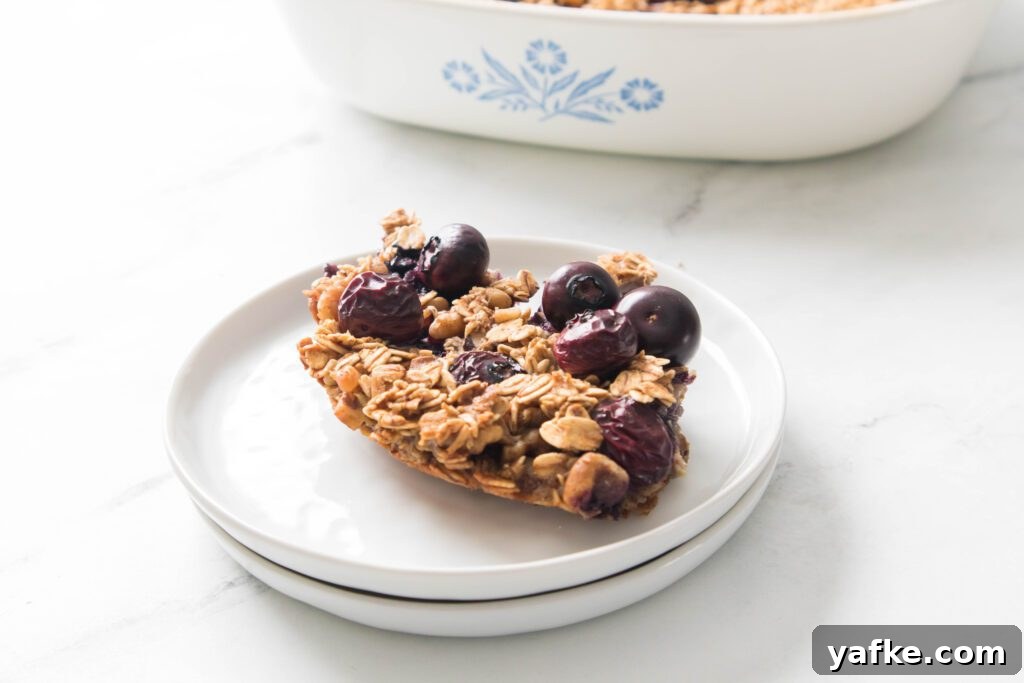 Blueberry Baked Oatmeal Blueberry Baked Oatmeal on a white plate