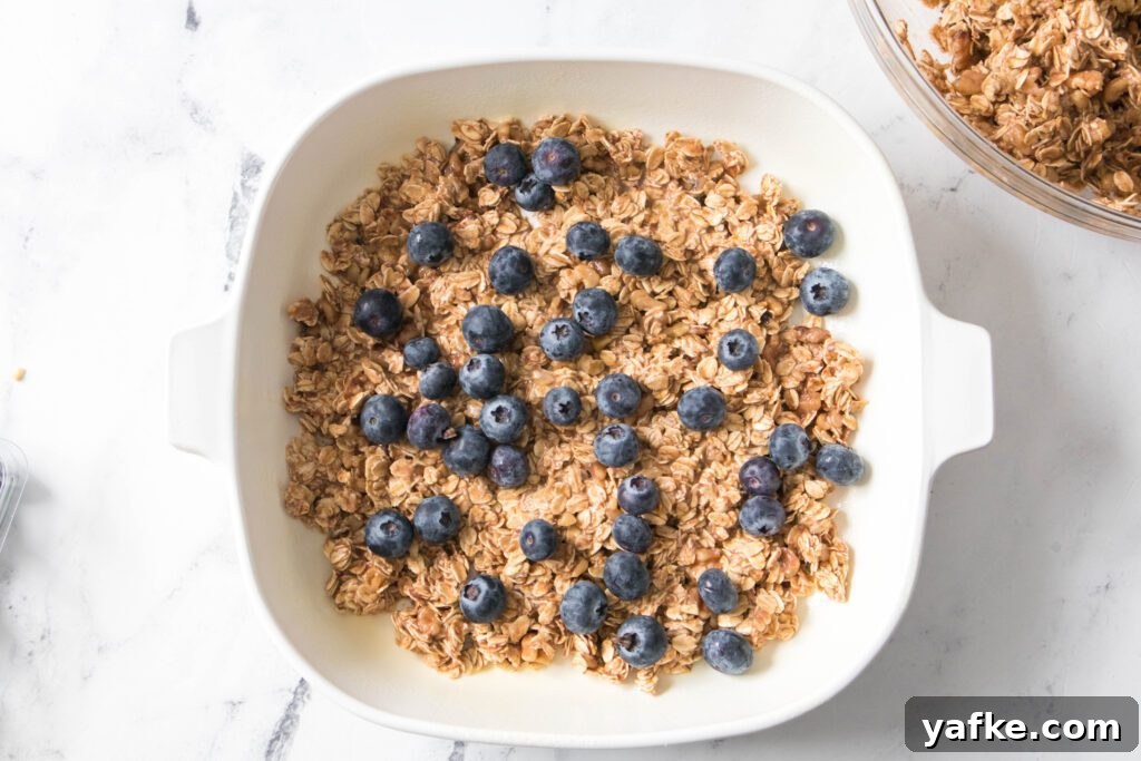 Blueberry Baked Oatmeal: Oven-Baked Breakfast Recipe 2 layer of blueberries on top