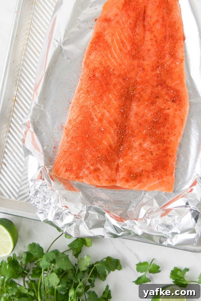 Zesty Oven-Baked Lime Salmon with Garlic and Herbs 3 Salmon Rubbed with spices before baking