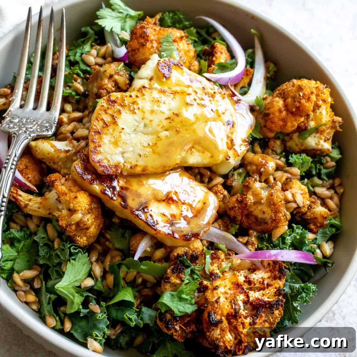 Grilled Halloumi Farro Bowls with Maple Dijon Dressing Recipe 2 Farro Bowls in a grey bowl.