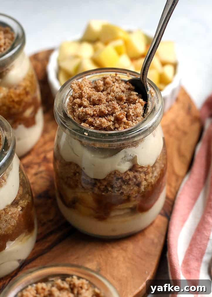 Paleo and Vegan Caramel Apple Parfaits Recipe 6 vegan paleo caramel apple parfaits with a spoon in a jar