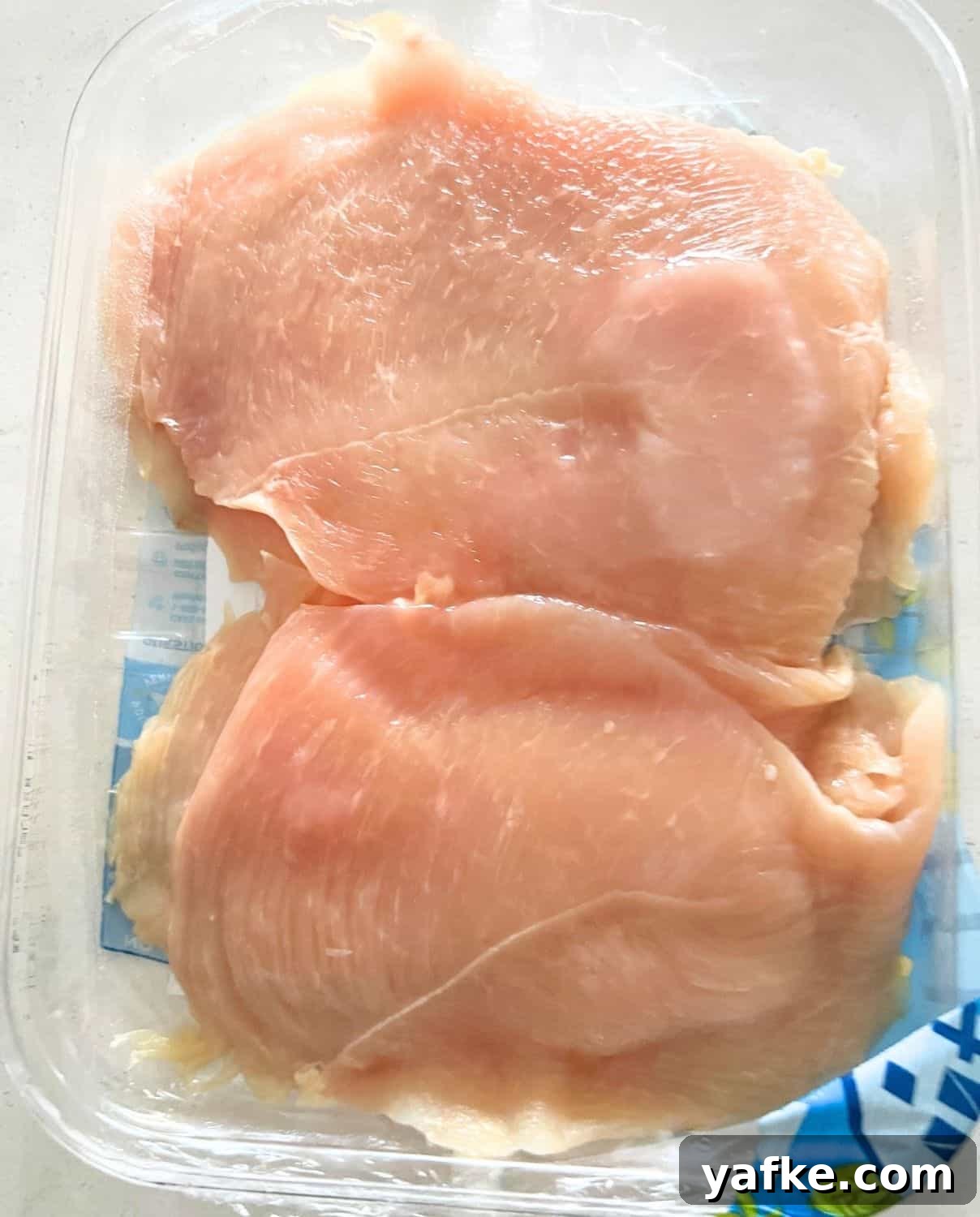 Chicken breasts ready for food processor. 