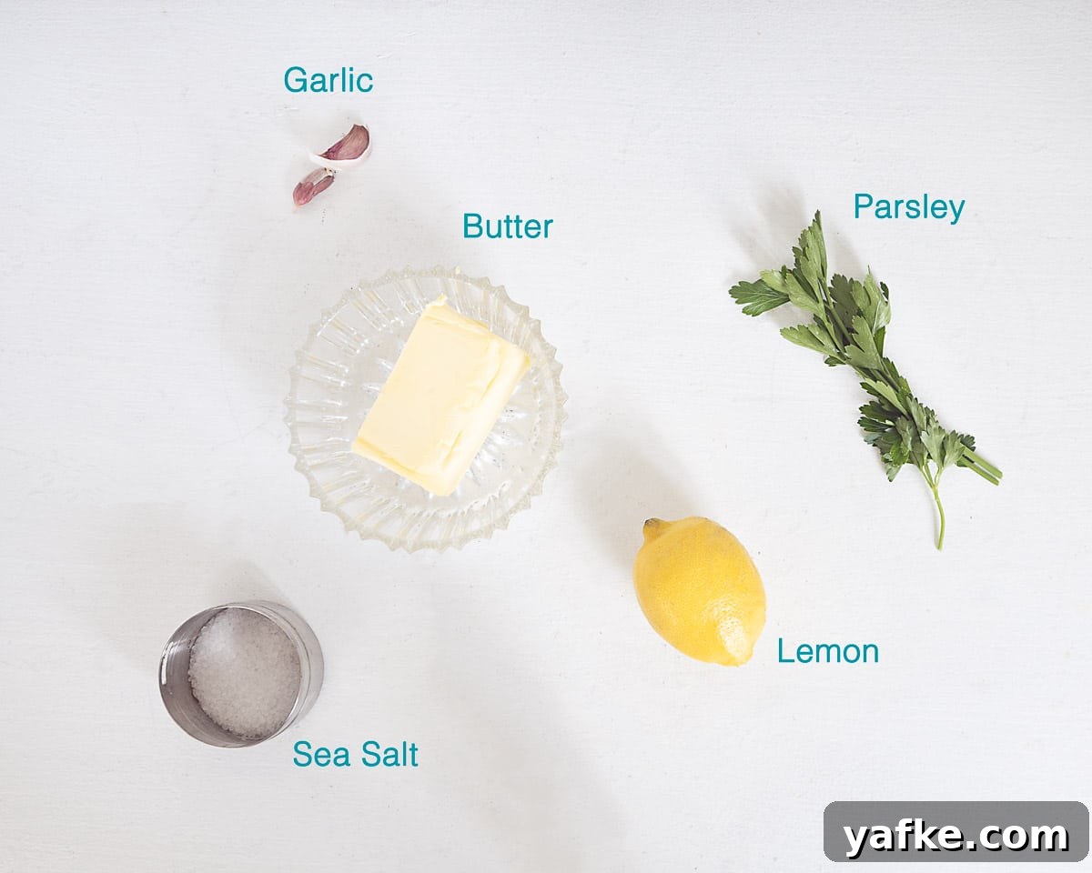 Homemade Garlic Herb Butter Recipe 3 Ingredients for garlic herb butter displayed on a white background
