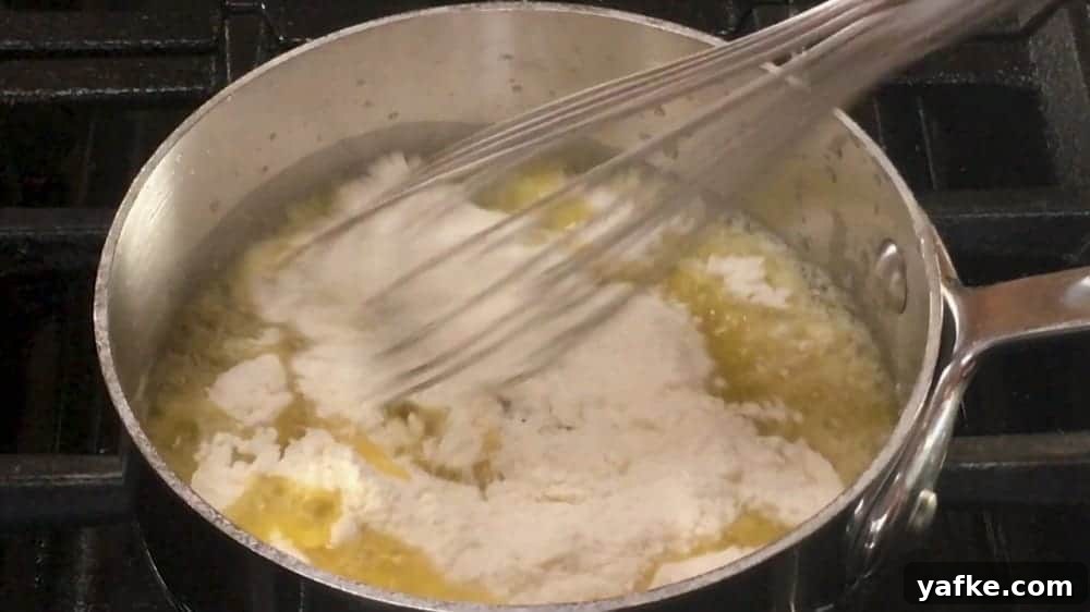 Classic Turkey Pot Pie Recipe with Flaky Golden Crust 4 making a roux