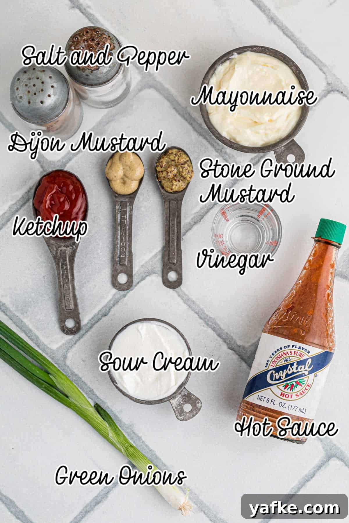 Creamy Remoulade Sauce Recipe for Seafood and Sandwiches 3 Ingredients needed to make remoulade sauce, with text overlay.