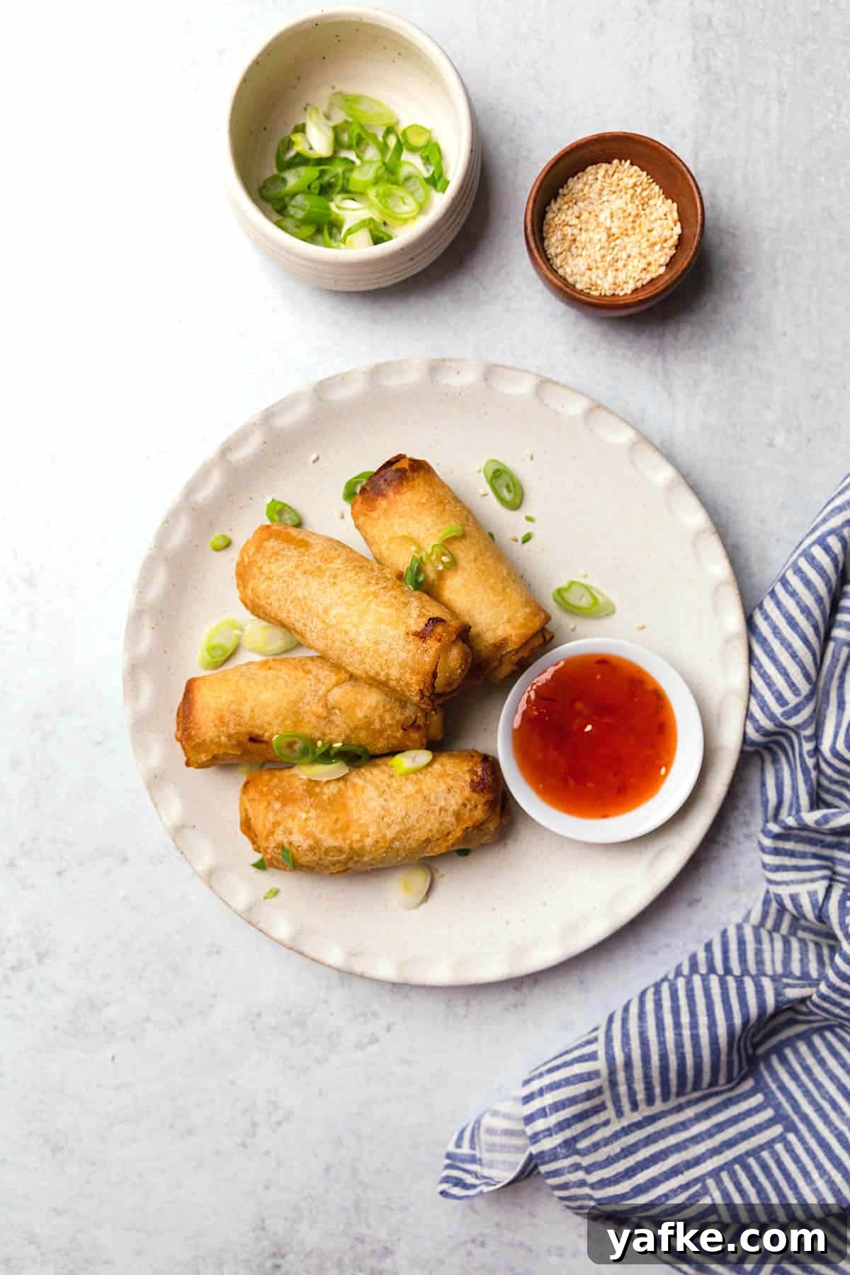 How to Air Fry Tai Pei Frozen Egg Rolls 2 A plate of crispy tai pei egg rolls