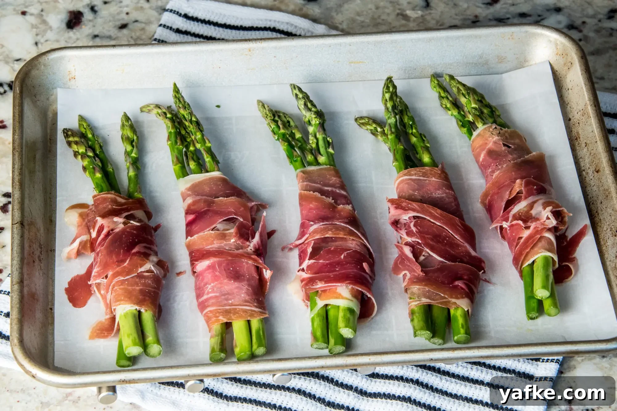 Asparagus with Ham and Manchego Recipe 4 Wrapped asparagus before roasting