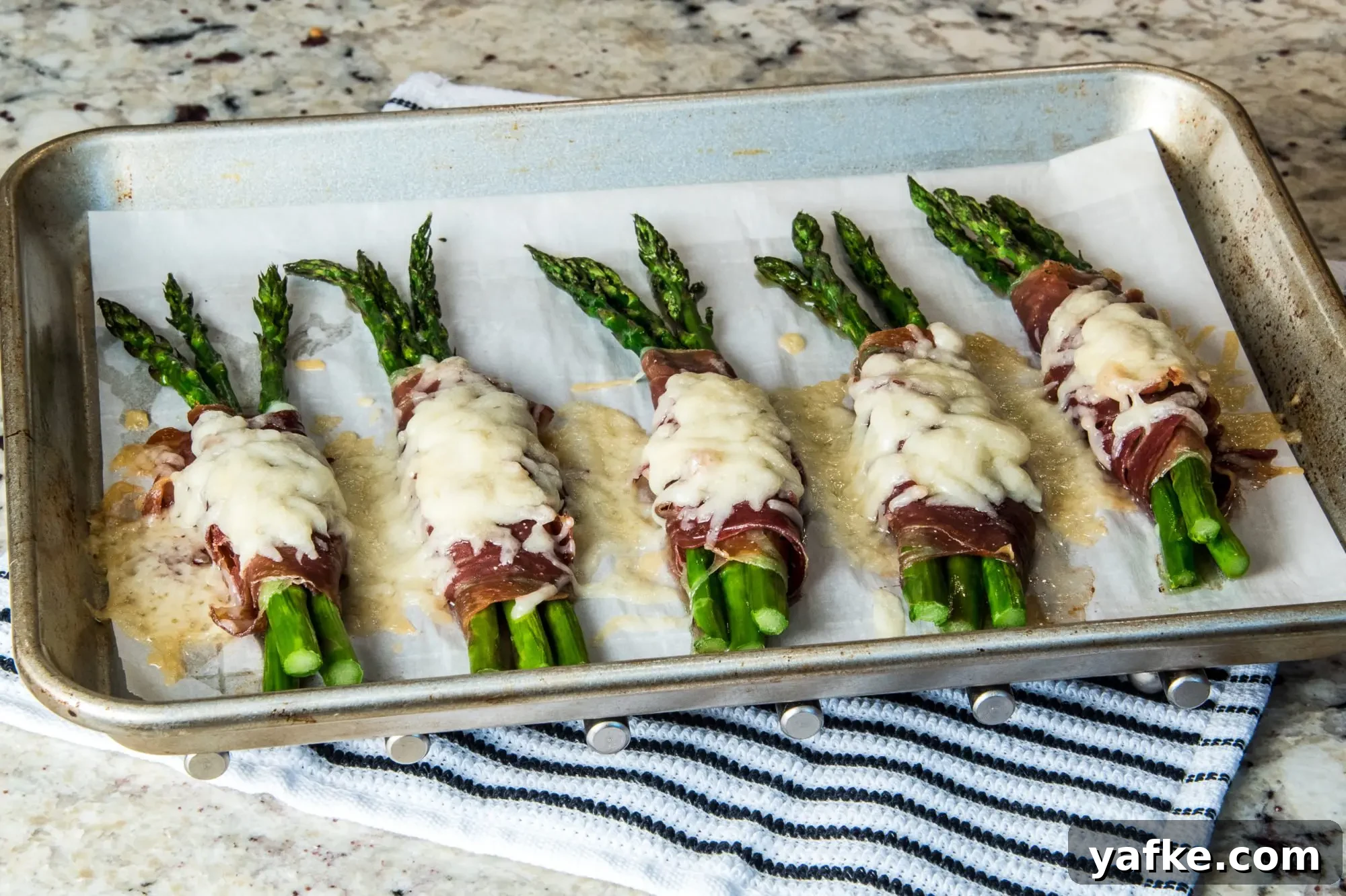 Asparagus with Ham and Manchego Recipe 5 Asparagus topped with melted Manchego