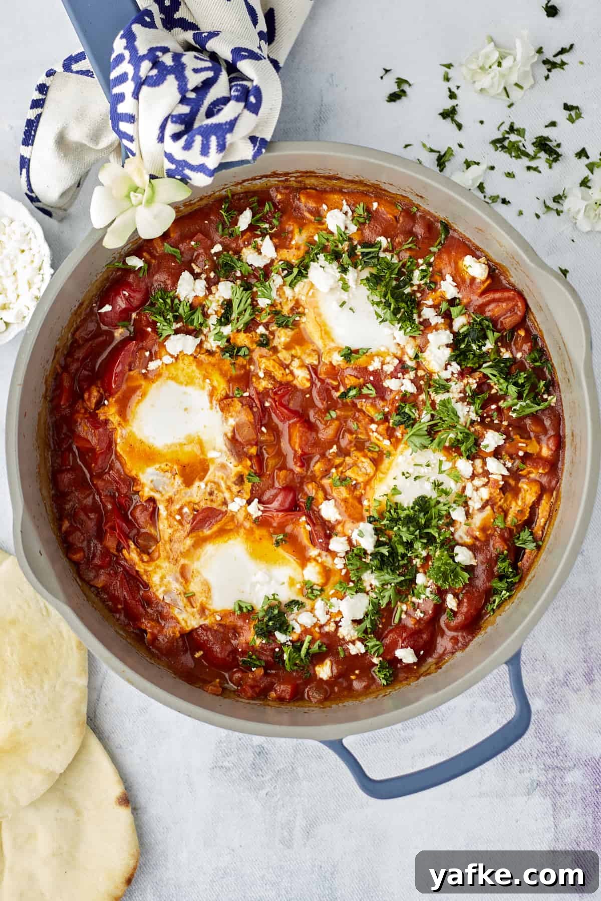 One-Pan Shakshuka with Feta and Fresh Herbs 8 overhead image of easy shakshuka with feta topped with fresh herbs