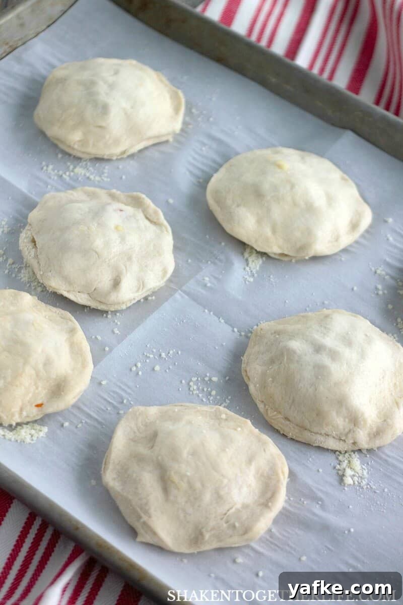 How to Make Pizza-Stuffed Waffles with Canned Biscuits 4 Pizza Stuffed Waffles! Once the biscuits are stuffed, seal the edges and pop them in a waffle maker!