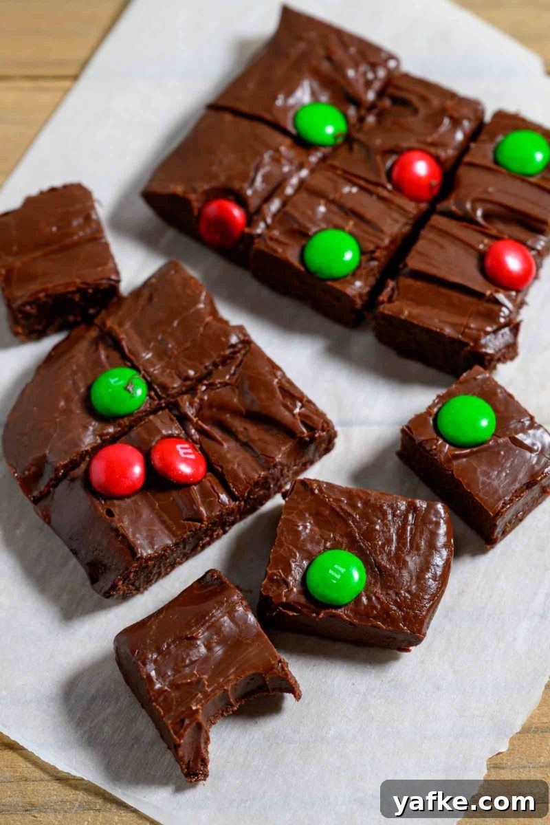 Decadent 4-Ingredient Chocolate Fudge 2 4 Ingredient Fudge on parchment paper.