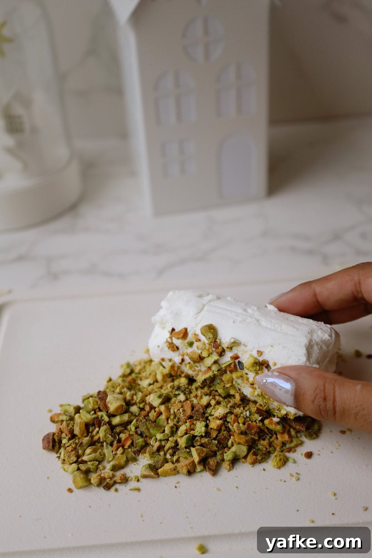 Festive Goat Cheese Appetizer Recipes for Holiday Parties 4 Step two: roll the goat cheese in the pistachios.