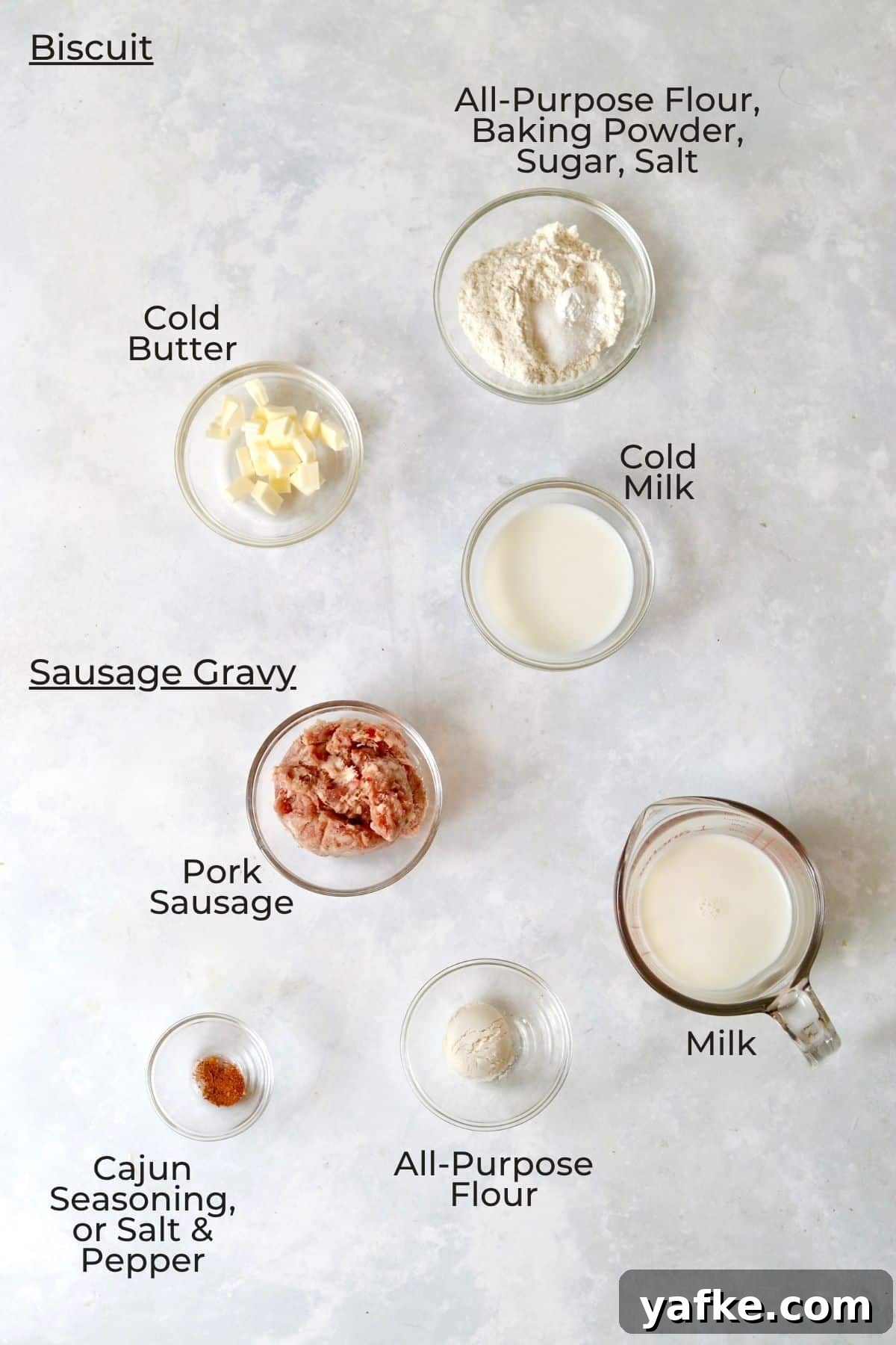 Single-Serve Biscuits and Sausage Gravy for One 3 Ingredients to make biscuits and gravy for one person in small glass bowls.