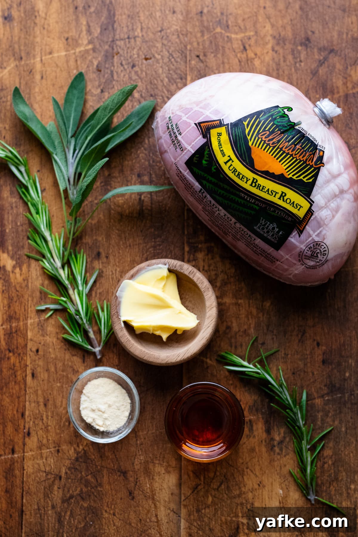 Juicy Maple Herb Air Fryer Turkey Breast 3 Ingredients for air fryer turkey breast arranged on a wooden board.