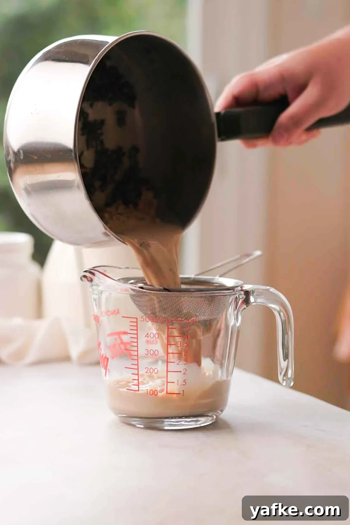 Earl Grey Creme Brulee Recipe with Tea-Infused Custard 5 step 2 strain infusion