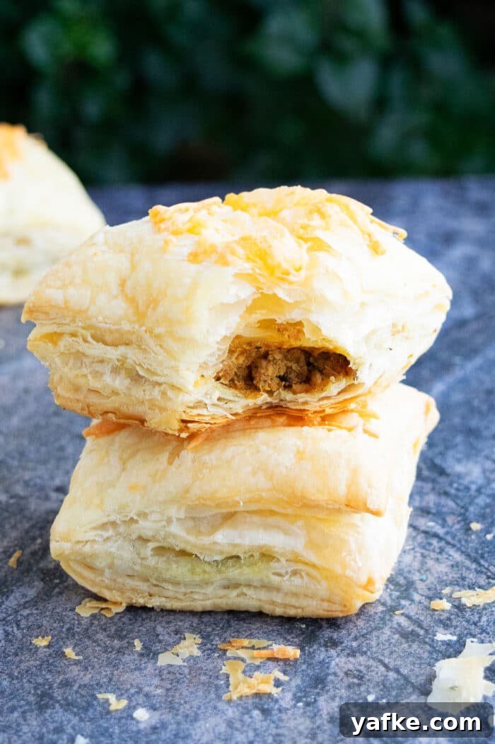 One-Pan Ground Beef Puff Pastry Pie 2 Stack of Ground Beef Puff Pastry on Rustic Gray Background.