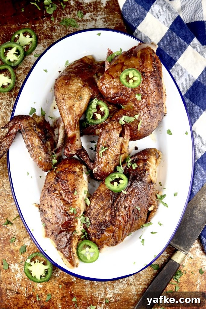 Cajun Butter Smoked Chicken is one of the most delicious dinners that you'll ever make on your back yard grill! Cajun Butter Smoked Chicken