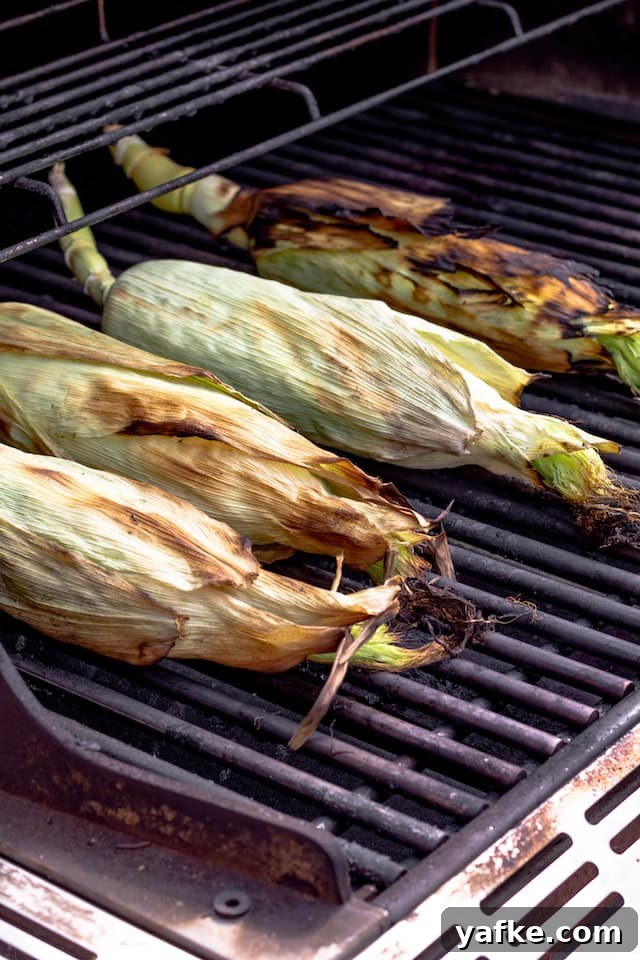 How to Grill Corn in the Husk for Smoky, Tender Kernels 4 How to Grill Corn in the Husk Cooked
