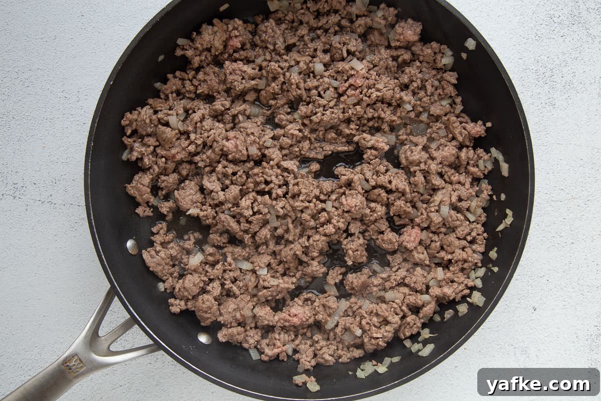 Classic Old Fashioned Sloppy Joes Sandwich Recipe 4 ground beef and chopped onion in a large skillet.