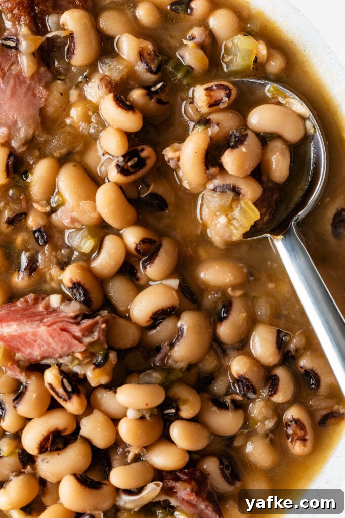 How to Cook Black-Eyed Peas for Tender, Flavorful Results 3 bowl of blacked eyed peas with a spoon