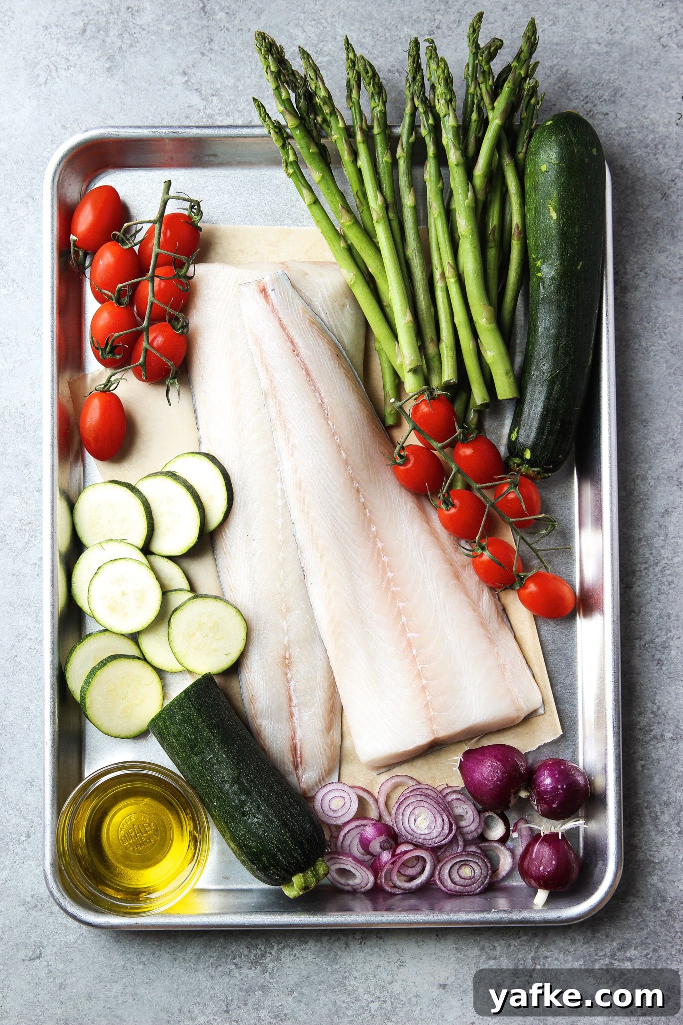 Foil-Baked Fish with Lemon, Garlic and Seasonal Vegetables 3 baked fish in foil with vegetables