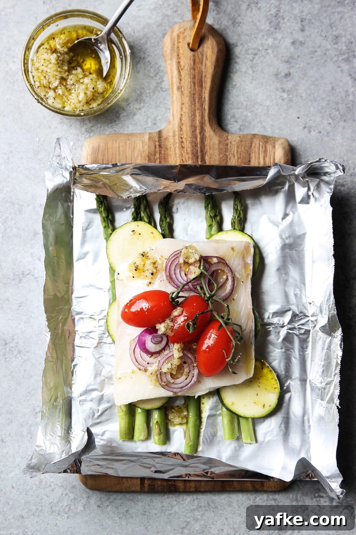 Foil-Baked Fish with Lemon, Garlic and Seasonal Vegetables 4 baked fish in foil