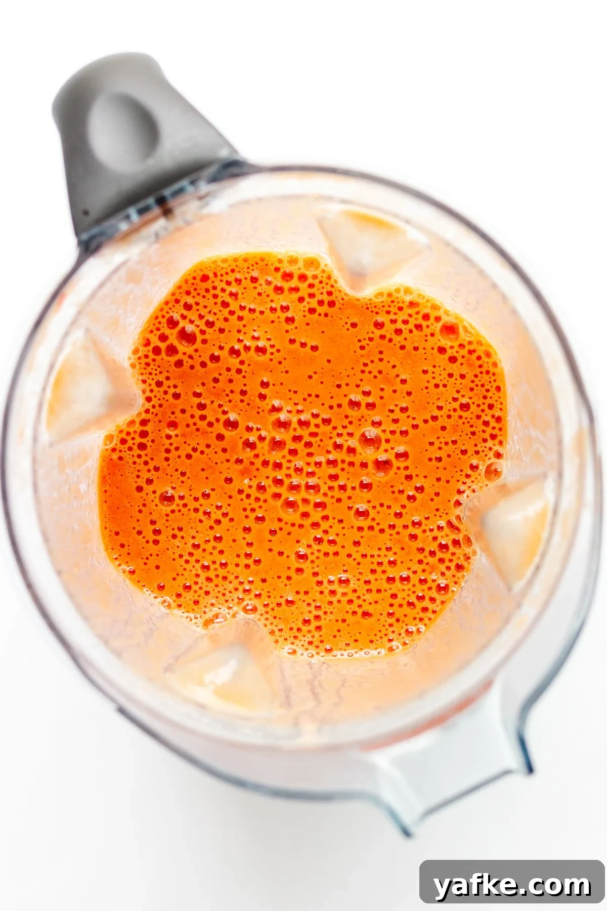 Vitamin C Boost Smoothie with Citrus and Berries 6 Overhead photo of open blender containing smoothie.