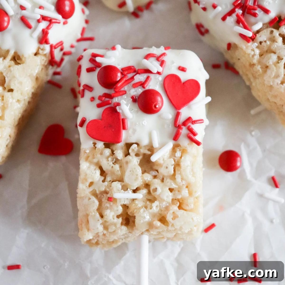 21 Patriotic Canada Day Desserts 8 canada day rice krispie treats on white surface