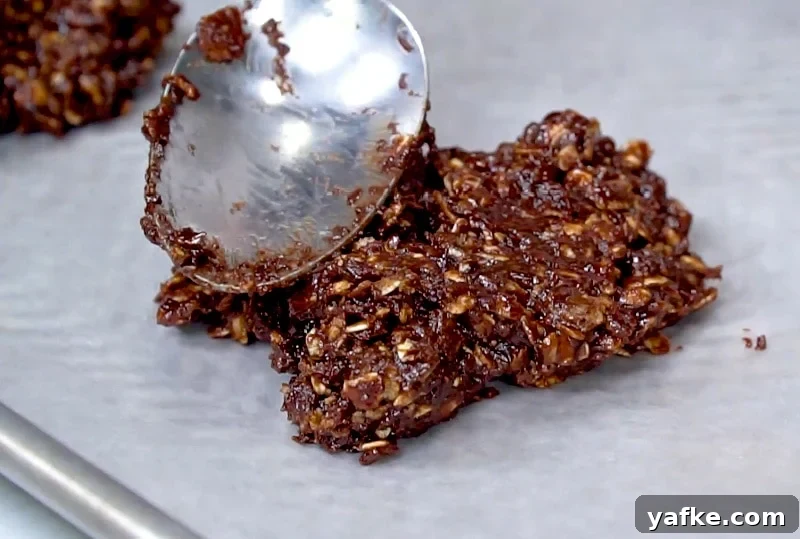 Chewy No-Bake Chocolate Oatmeal Cookies 5 Cookie being formed.