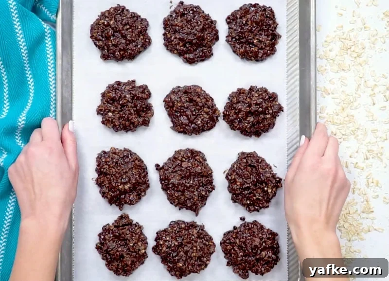 Chewy No-Bake Chocolate Oatmeal Cookies 6 Cookies on baking sheet.