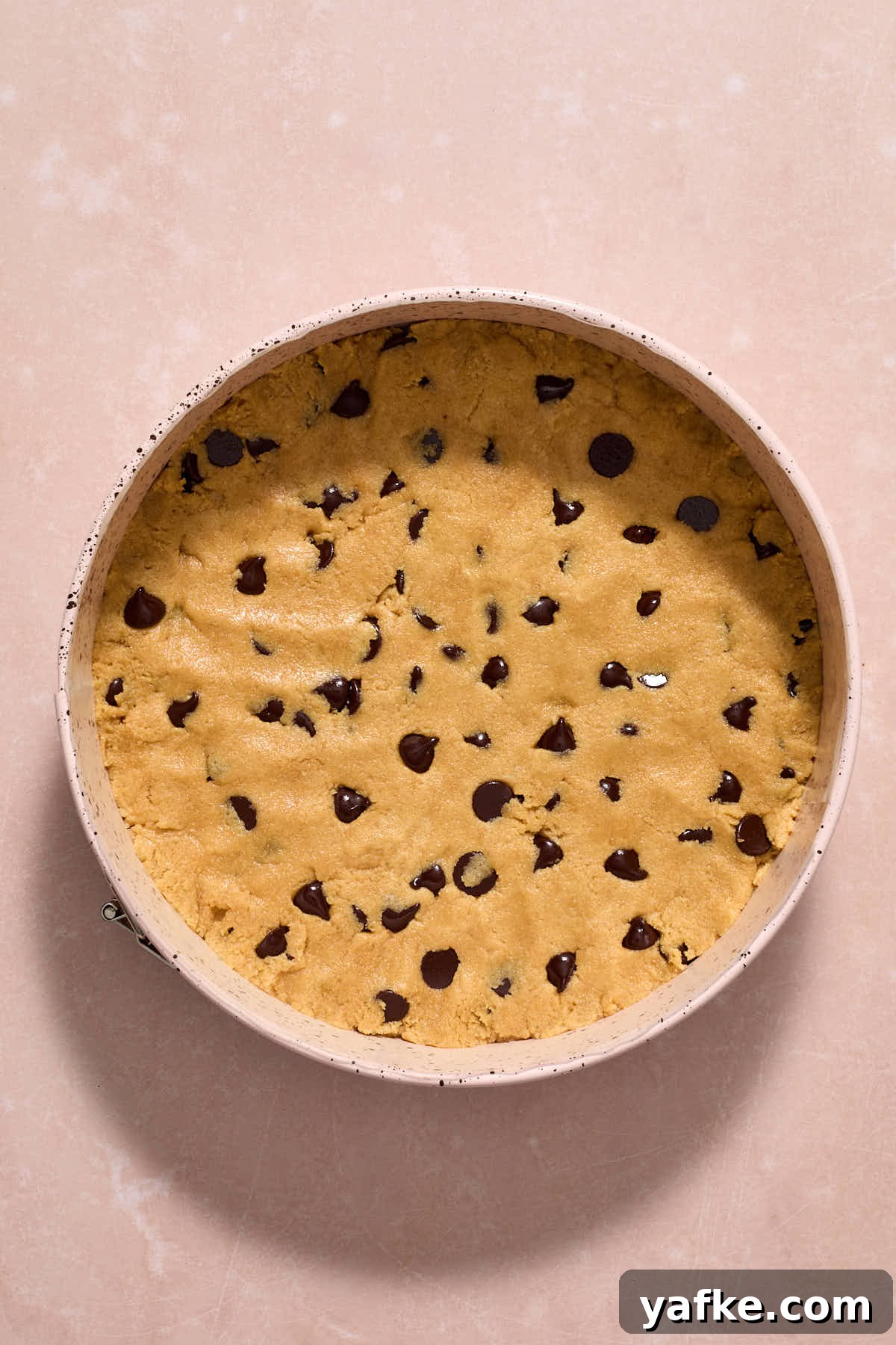 Almond Flour Cookie Cake with Peanut Butter and Chocolate Chips 10 Cookie dough pressed into a springform pan.