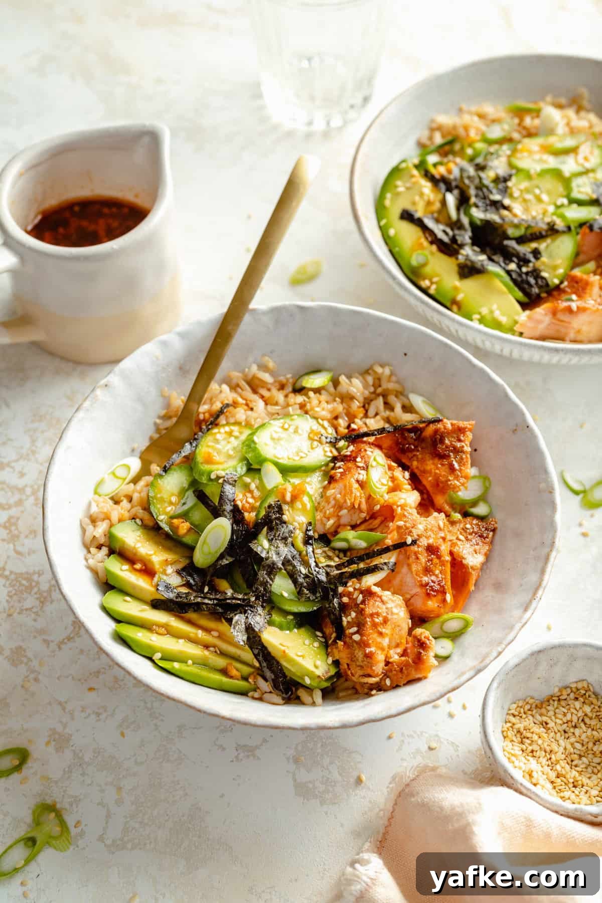 Oven-Baked Salmon Sushi Bowls with Sticky Rice and Avocado 3 Baked Salmon Sushi Bowls