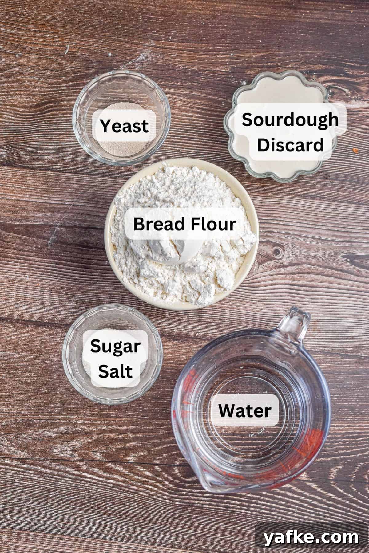 New York-Style Bagels Made with Sourdough Discard 3 The ingredients for the sourdough discard bagels are laid out and labeled.