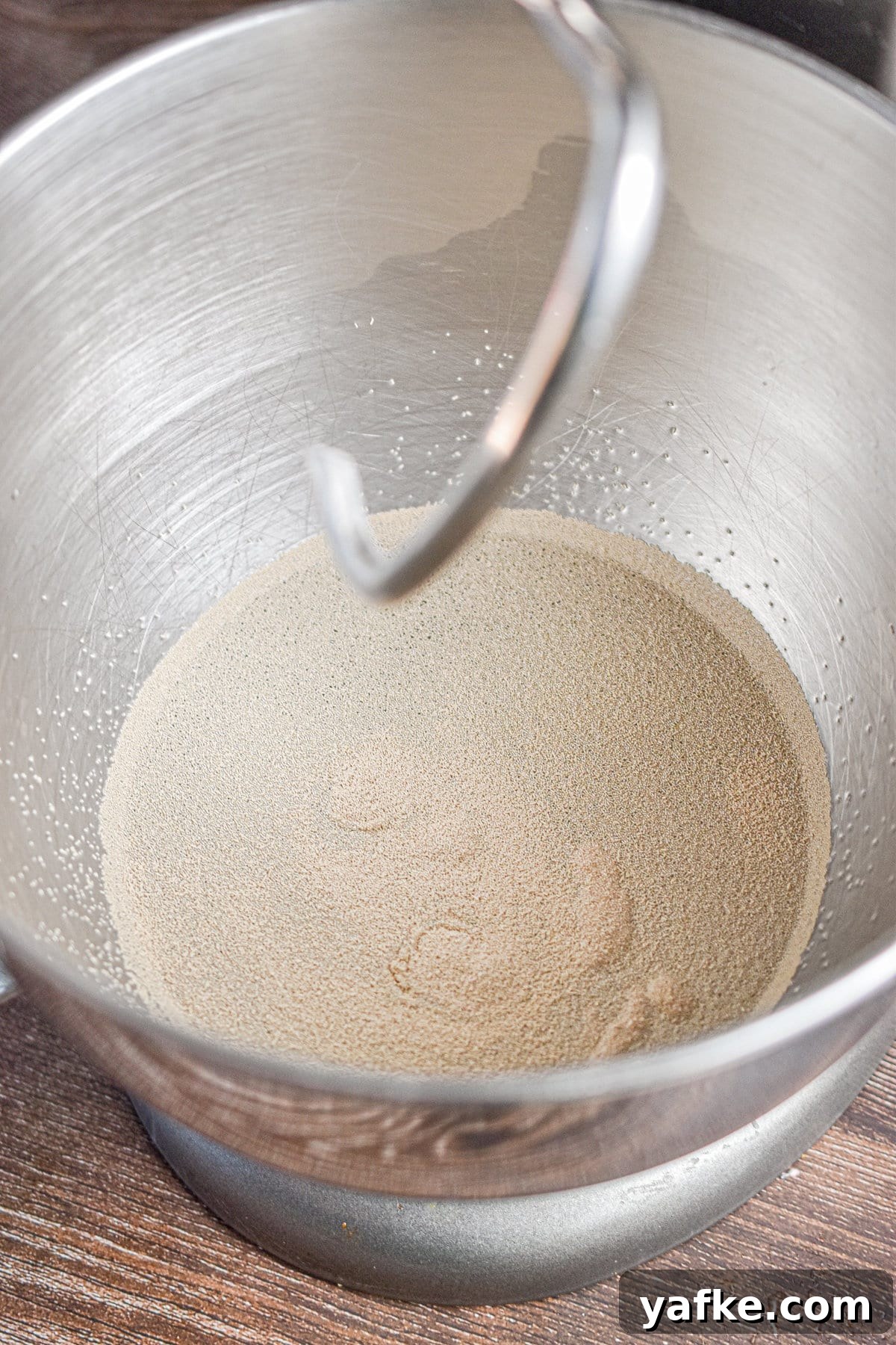 New York-Style Bagels Made with Sourdough Discard 4 The water and yeast are added to the bowl of a stand mixer.