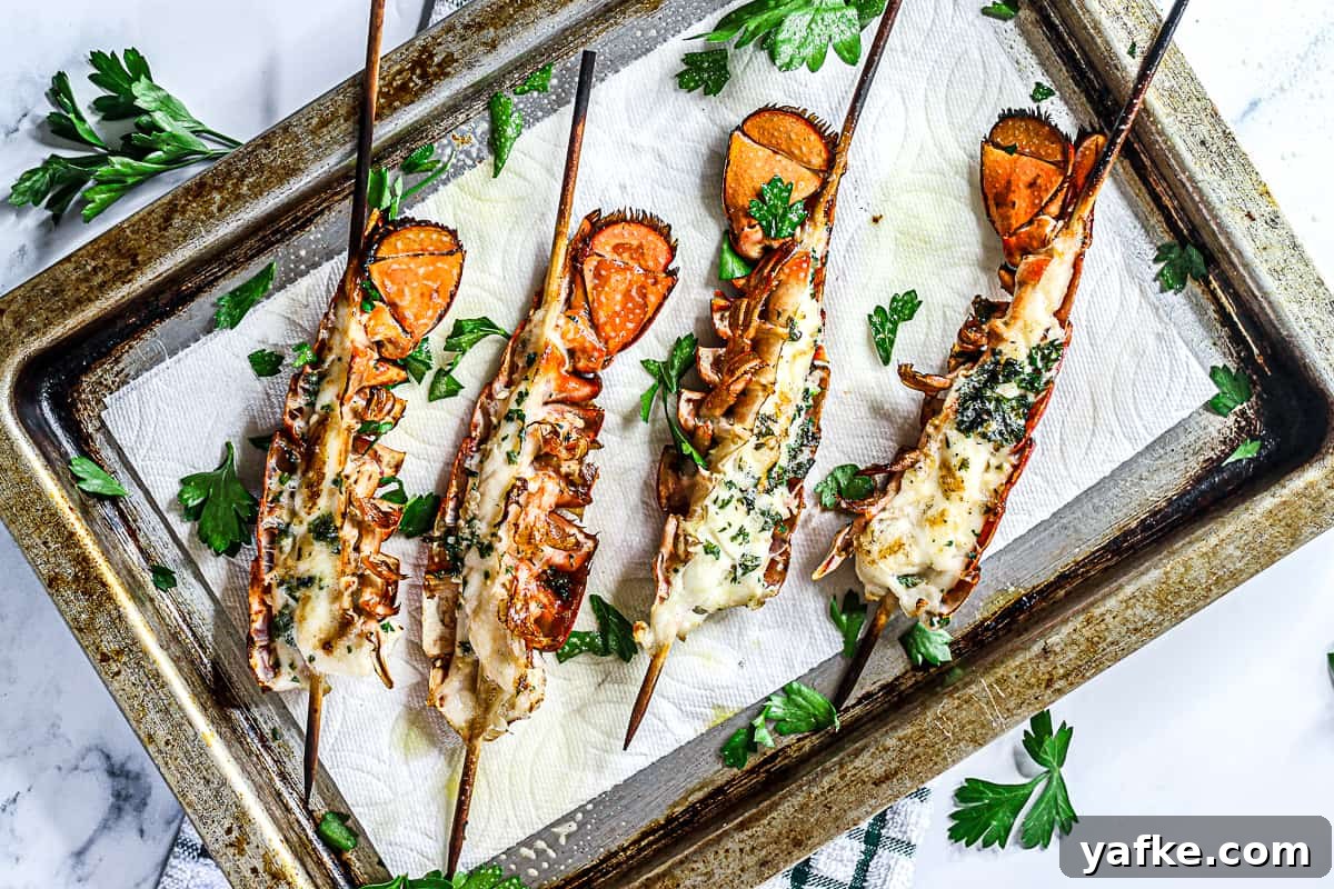 How to Make Sous Vide Lobster Tail with Buttery Sauce 2 Cooked sous vide lobster tails.