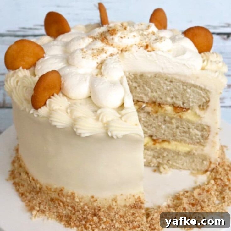 Banana Pudding Cake on a cake pedestal.