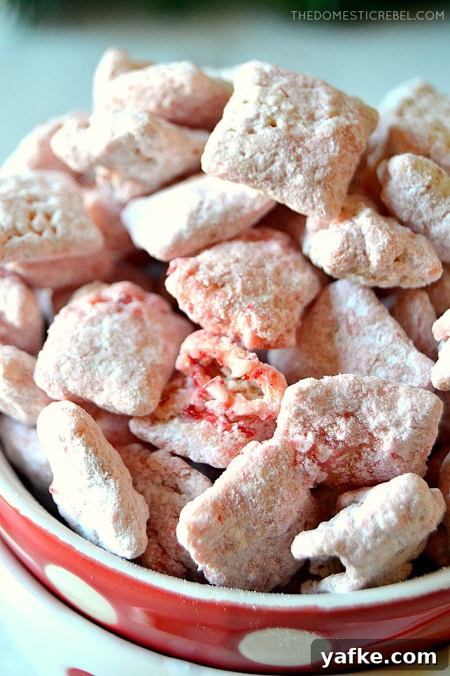 Closeup bowl of peppermint candy cane muddy buddies