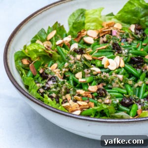 Mixed greens with green beans and cherries