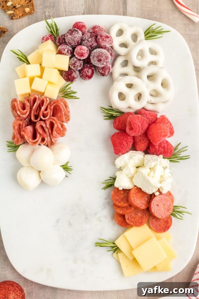 17 Festive Christmas Charcuterie Board Ideas 3 Candy Cane Christmas Charcuterie Board