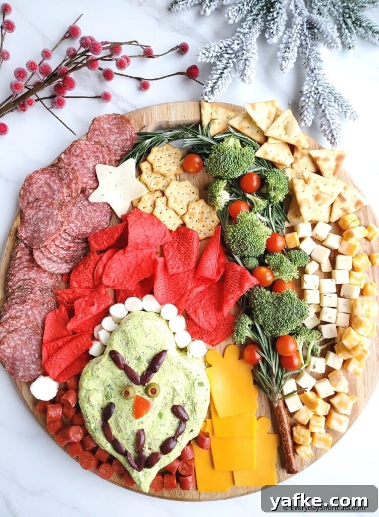 17 Festive Christmas Charcuterie Board Ideas 6 Grinch Snack Board for Christmas