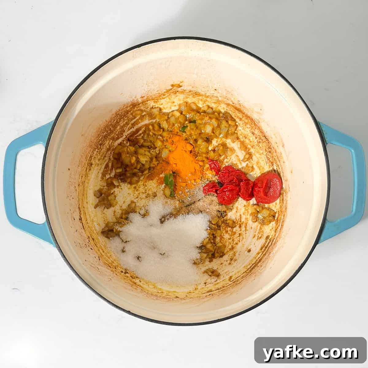 Creamy Beef Curry with Coconut Milk Recipe 9 Adding all the spices to the saucepan for the beef curry.