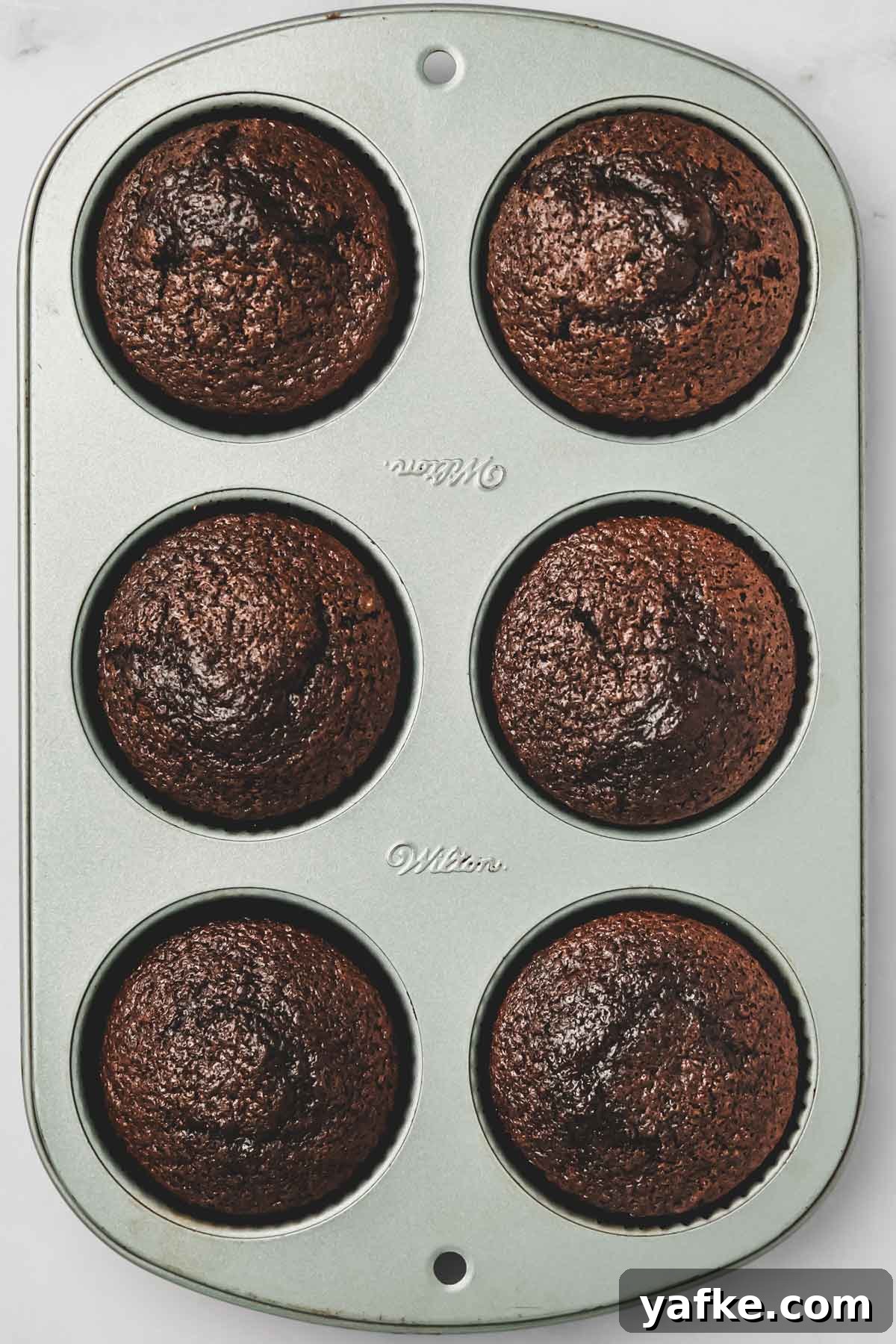 Small-Batch Chocolate Cupcake Recipe 7 freshly baked small batch chocolate cupcakes