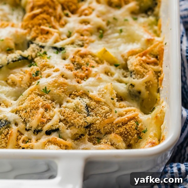 Cheesy Squash Casserole is the kind of side dish that will impress even the pickiest of eaters.