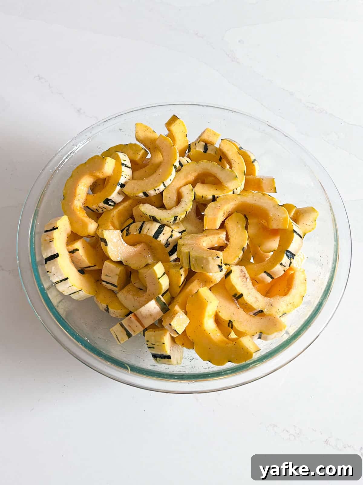 Roasted Delicata Squash with Herbed Yogurt Recipe 6 A bowl of delicata squash slices.