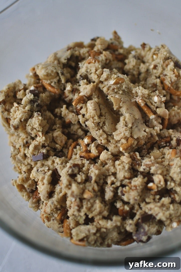 Cookie dough after adding in the nuts, chocolate chunks, and pretzels.