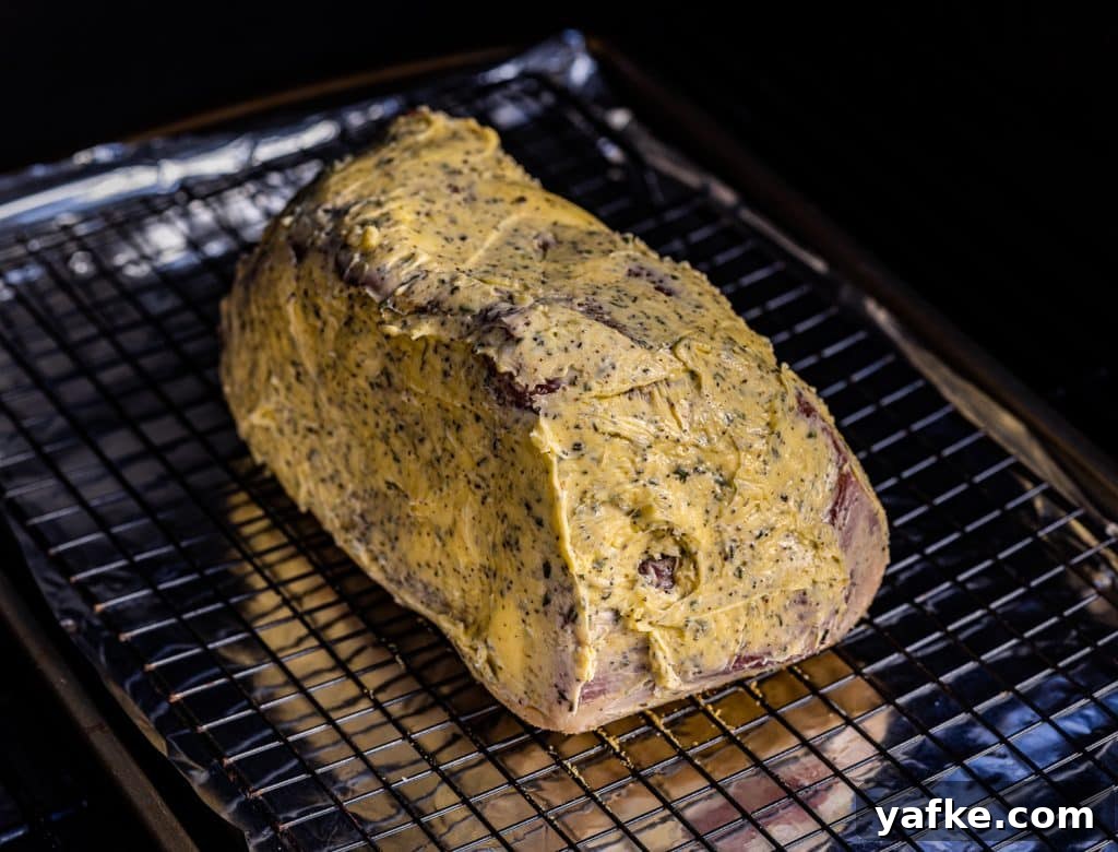 Smoked Bottom Round Roast with Garlic and Herbs Recipe 4 Buttered round roast on the smoker.