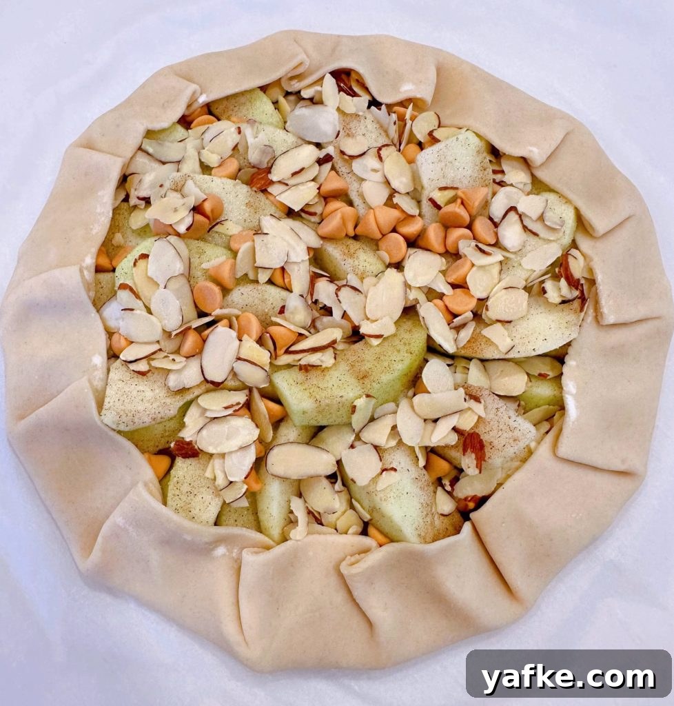 Rustic Apple Almond Galette Recipe with Flaky Crust 10 Edge of galette crust folded over.